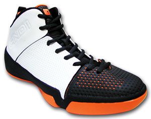 Ankle high basketball shoes with a white mid-section, black toe, orange outsole, black tongue, and black laces. AND1 logos are located on the heel and tongue of the shoe.