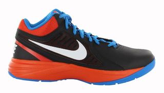 Ankle high basketball shoes that are black with an orange trim, and light blue outsole and laces. A white Nike swoosh is on the side of the shoe and the word 'NIKE' is printed in big letters on the heel of the shoe.
