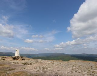 Trigpoint at the top of sugar loaf mountain.